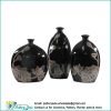 Ornamental ceramic vase oval with small spout, lotus black